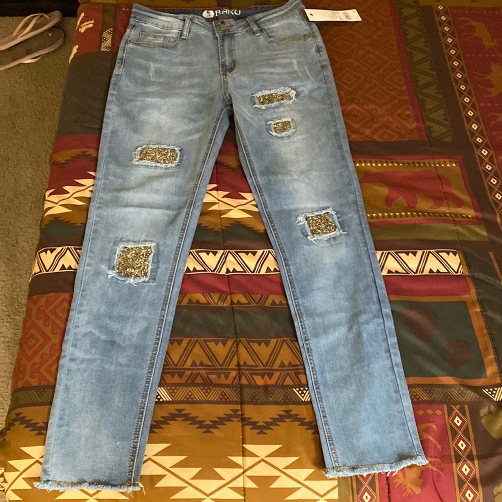 Brand new with tags BAKU jeans. Size 4
